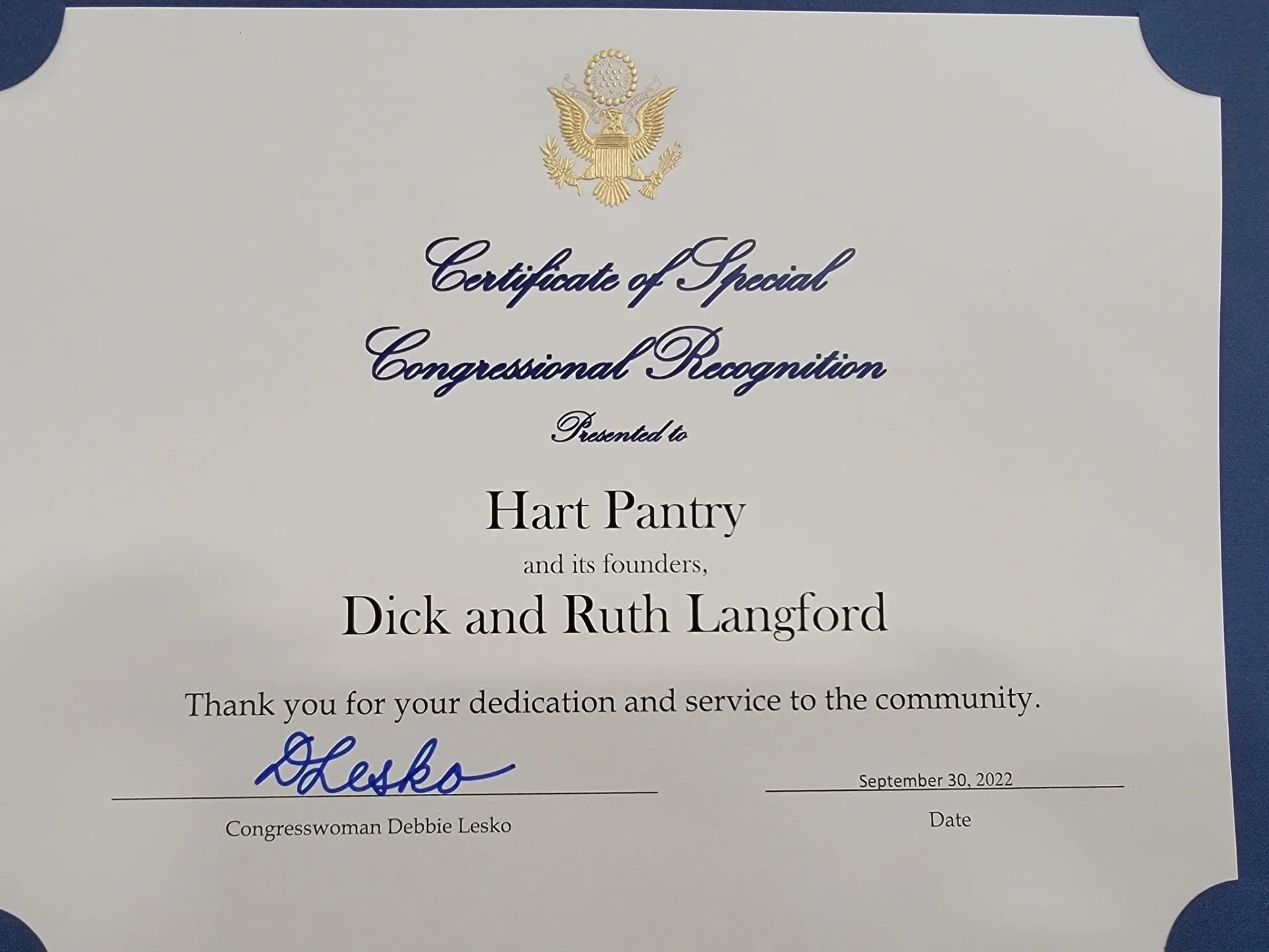 A certificate of special congressional recognition for hart pantry and its founders.