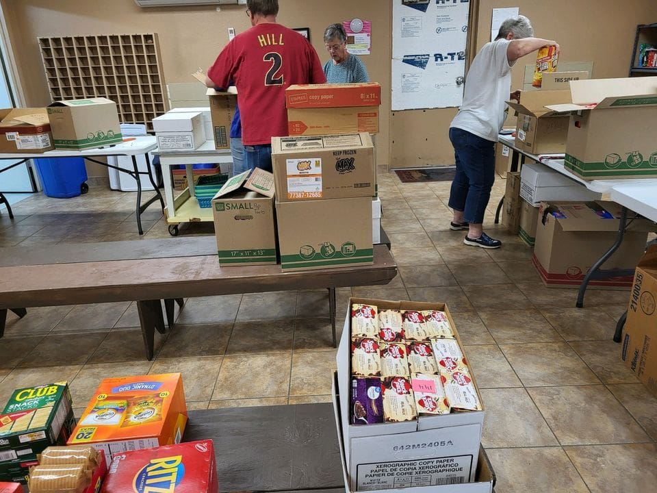 Peoria Traditional food drive 2024 boxes with people