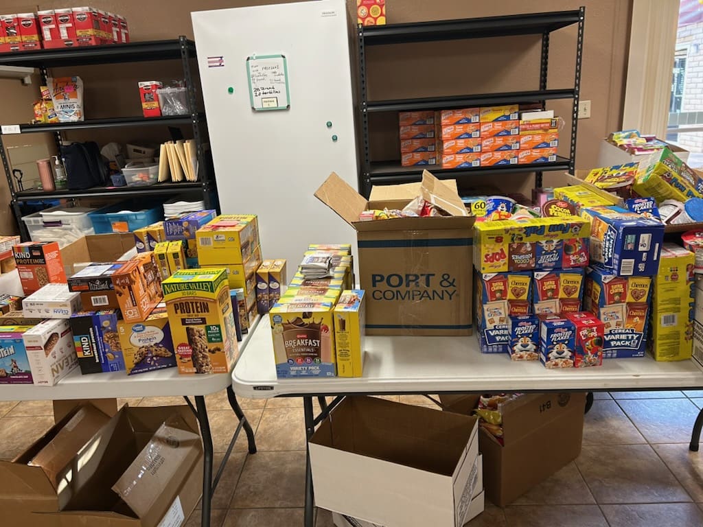 Tables of assorted boxed snacks in pantry